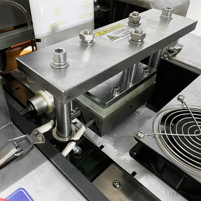 Automatic condom packaging machine