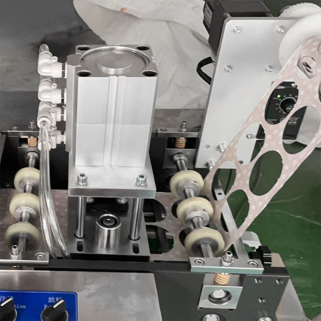 Automatic condom special-shaped packaging machine