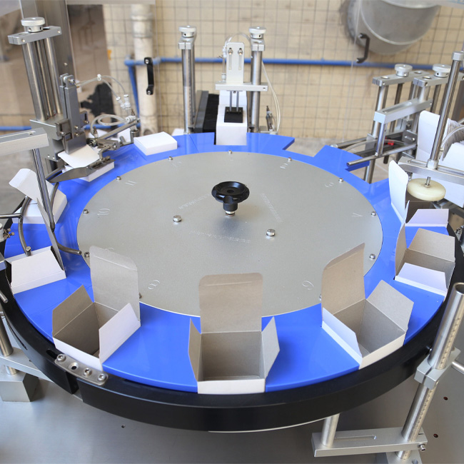 Top opening cartoning machine