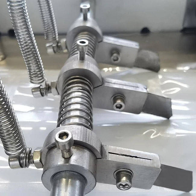 Automatic condom packaging machine