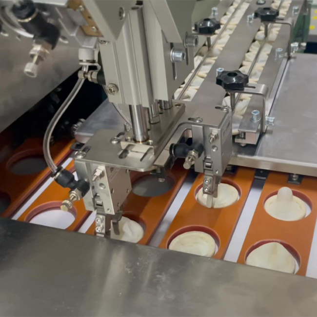 Automatic condom special-shaped packaging machine