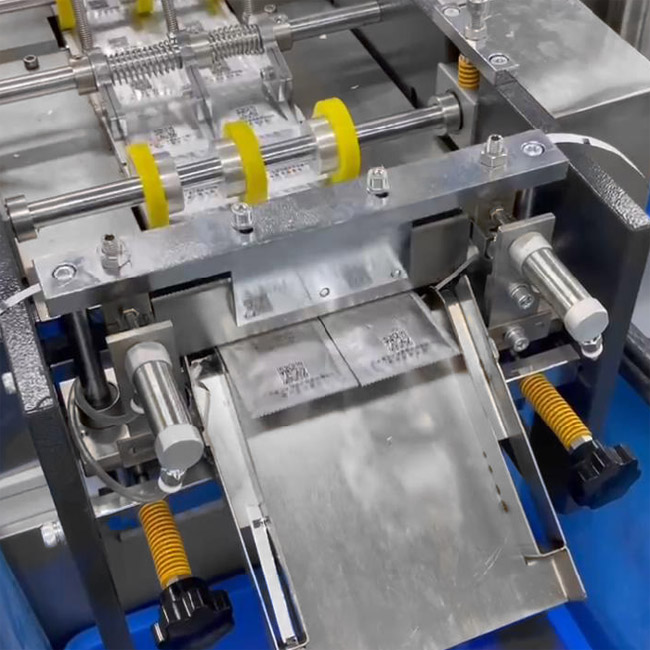 Automatic condom packaging machine