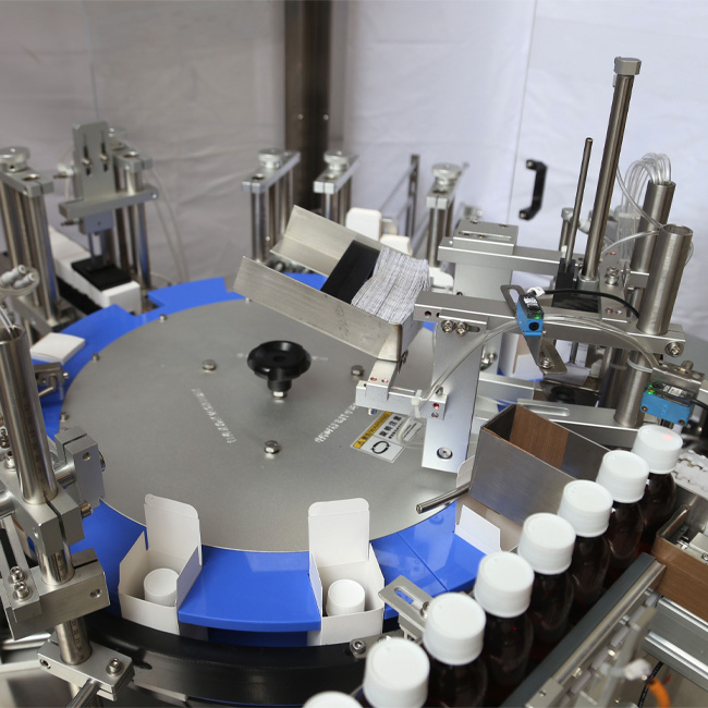 Top opening cartoning machine